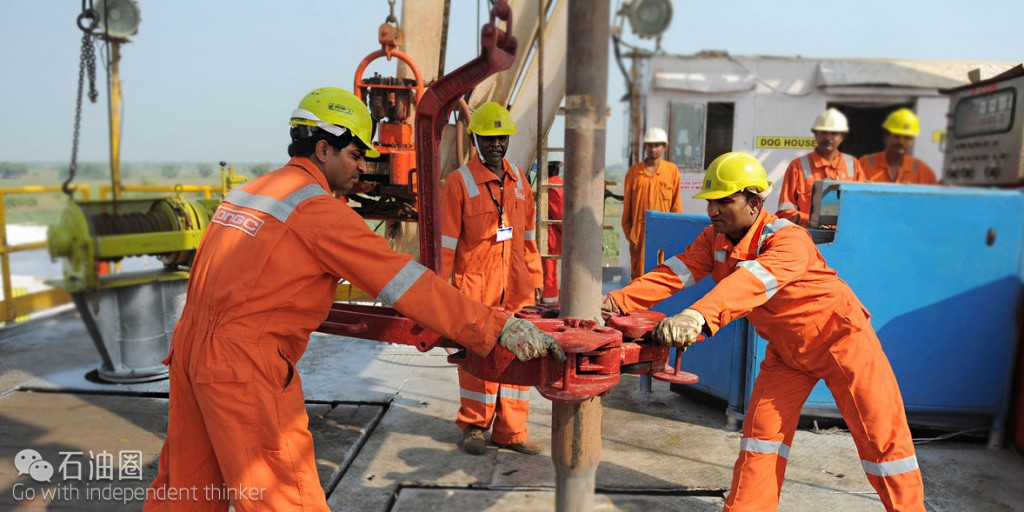 Indian technicians work on the country's first shale-gas exploratory well at ONGC Ankleshwar Asset near Jambusar, some 170 kms from Ahmedabad on November 26, 2013. Indian Minister for Petroleum and Natural Gas, M Veerappa Moily, with ONGC's chairman and managing director Sudhir Vasudeva, attended the dedication ceremony of the country's first shale-gas exploratory well being dug in the Cambay Basin. AFP PHOTO / Sam PANTHAKY (Photo credit should read SAM PANTHAKY/AFP/Getty Images)